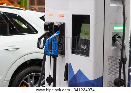 Modern Electrical Fast Charger To Electrical Or Hybrid Phev Automobiles. Future Energy Power. Ecolog