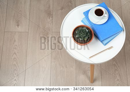 Beautiful Echeveria Plant, Books And Cup Of Coffee On White Table At Home, Above View. Space For Tex