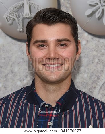 LOS ANGELES - DEC 07:  JT Neal arrives for the Brooks Brothers Holiday Celebration Honoring St. Jude on December 07, 2019 in West Hollywood, CA
