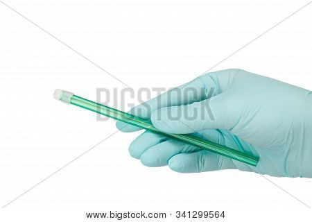 Dentist's Hand In Glove With A Saliva Ejector.