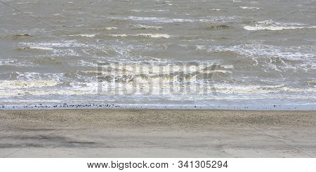 Landscape Scenery Of Empty Sand Sea Beach And Bay Of Wave Water. Tropical Holiday Backdrop Backgroun