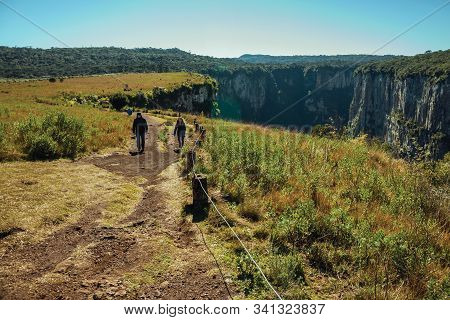 Cambara Do Sul, Brazil - July 16, 2019. Pathway And People At The Itaimbezinho Canyon With Rocky Cli