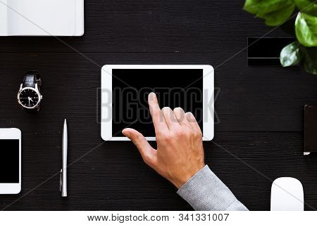 Businessman Using Digital Tablet Mock Up Screen On Business Office Table, Male Hand On Computer Devi