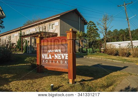 Gramado, Brazil - July 21, 2019. Entrance With Garden And Signboard From Villa Da Neve Guesthouse In