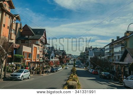 Gramado, Brazil - July 21, 2019. Buildings With Shops And People On Causeway At Borges De Medeiros A