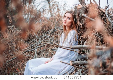 Outdoor Portrait Of Beautiful Blue Eyed Girl In White Dress, Looking Like A Fairy. Retro Vibes