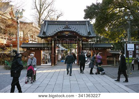 Chichibu, Japan - 4 1 2019: A Group Of People Entering And Exiting A Shinto Shrine In Japan