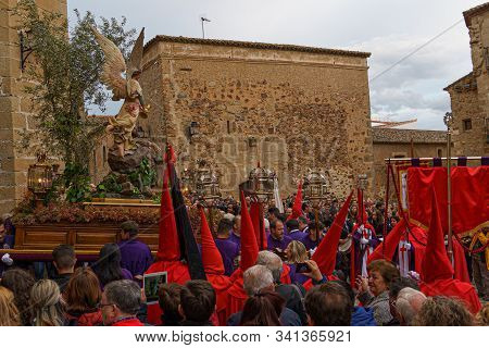 Caceres, Spain. April 2019: A Group Of Bearers, Called Costaleros, Carrying A Religious Float