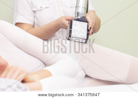 Lpg Girl Body Massage In Spa. The Girl Is Given A Hardware Massage, She Is Wearing A Special Jumpsui