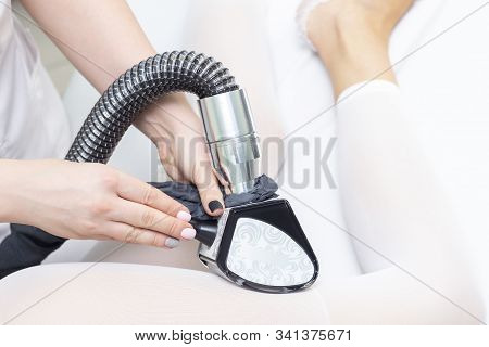 Lpg Girl Body Massage In Spa. The Girl Is Given A Hardware Massage, She Is Wearing A Special Jumpsui