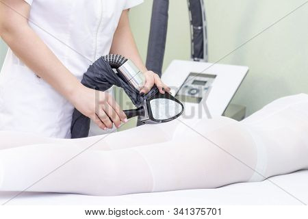 Lpg Girl Body Massage In Spa. The Girl Is Given A Hardware Massage, She Is Wearing A Special Jumpsui