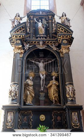 BRONNBACH, GERMANY - JULY 07, 2018: Altar of the Holy Cross in Cistercian Abbey of Bronnbach in Reicholzheim near Wertheim, Germany
