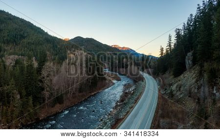 Aerial Panoramic View Of The Famous Scenic Drive, Sea To Sky Highway, During A Colorful Sunrise. Loc
