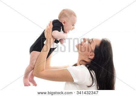 Woman And Little Child. Mom And Son Are Lying On The Bed. Lifestyle, Emotions. Isolat