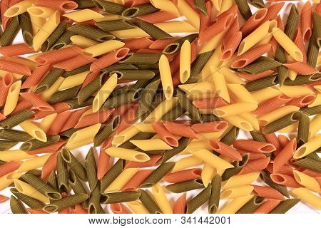 Three-colored Obliquely Cut Tubes Of Pene Paste, Scattered Like A Background.
