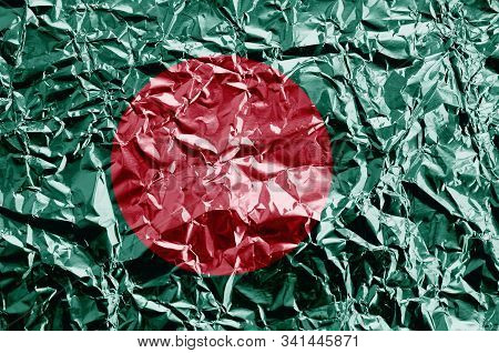 Bangladesh Flag Depicted In Paint Colors On Shiny Crumpled Aluminium Foil Closeup. Textured Banner O