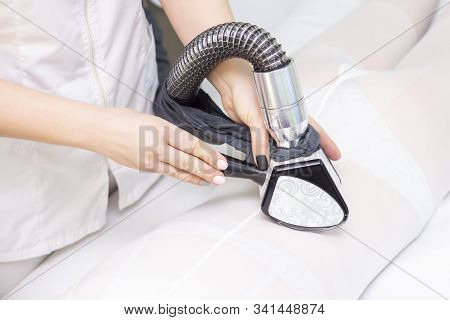 Lpg Girl Body Massage In Spa. The Girl Is Given A Hardware Massage, She Is Wearing A Special Jumpsui