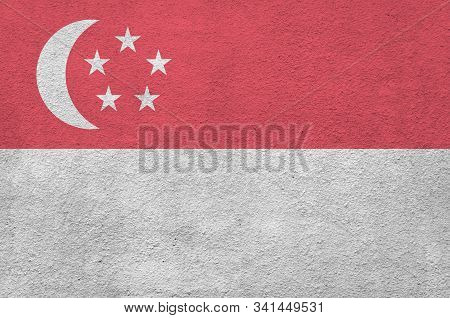 Singapore Flag Depicted In Bright Paint Colors On Old Relief Plastering Wall. Textured Banner On Rou