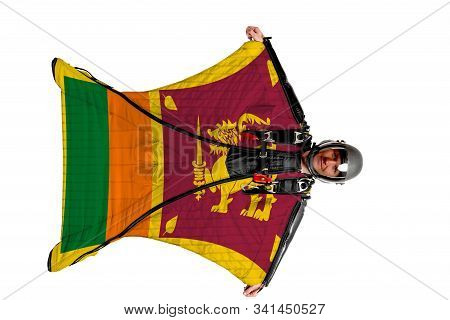 Sri Lanka Extreme Travel. Simulator Of Free Fall. Men In Wing Suit.