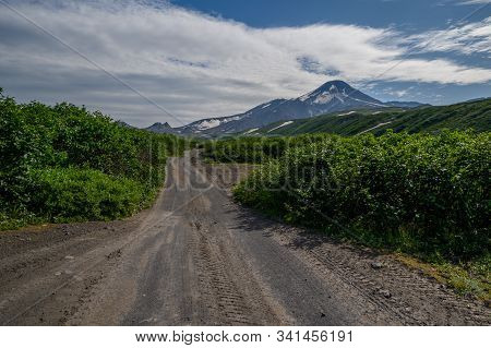 Panoramic View Of The City Petropavlovsk-kamchatsky And Volcanoes: Koryaksky Volcano, Avacha Volcano