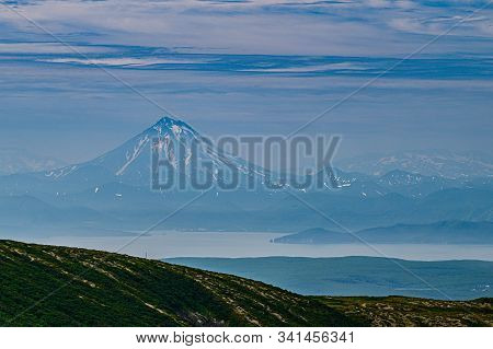 Panoramic View Of The City Petropavlovsk-kamchatsky And Volcanoes: Koryaksky Volcano, Avacha Volcano