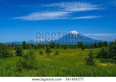 Panoramic View Of The City Petropavlovsk-kamchatsky And Volcanoes: Koryaksky Volcano, Avacha Volcano