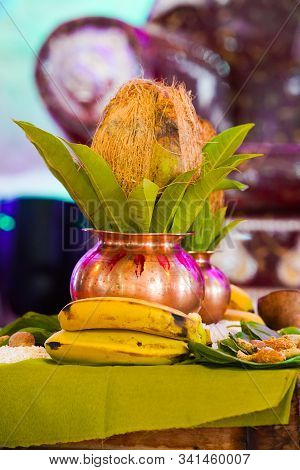 Traditional Indian Wedding Ceremony:  Coconut In Decorative Coper Kalash
