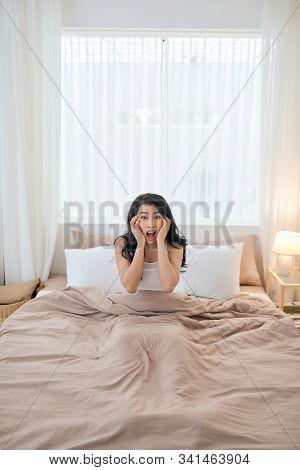 Asian Girl Shocked As She Wakes Up Late.