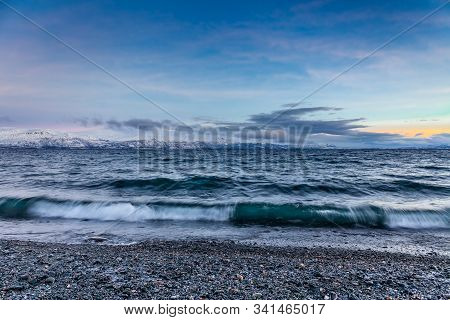 Beautiful View Over Beach And Fjord. Tornetrask, Sweden. Winter. Polar Night. Long Shutter Speed