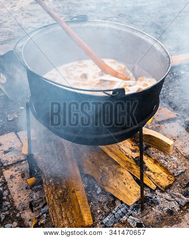 Romanian Traditional Food Prepared At The Cauldron On The Open Fire With Wood, Christmas Tradition