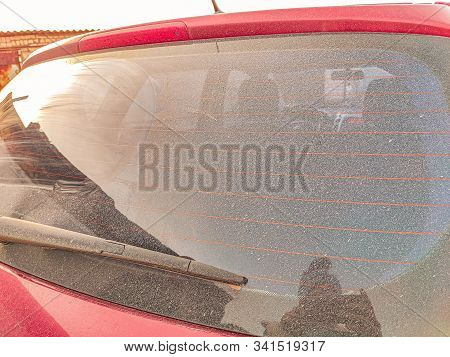 A Dirty Red Car After Rain. Dirty Car After A Trip Around The Countryside