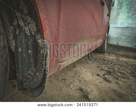 A Dirty Red Car After Rain. Dirty Car After A Trip Around The Countryside