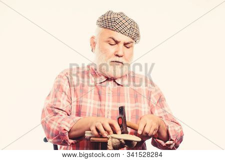 Retro Man Repair Shoes With Hammer. Cobbler Workmanship. Mature Shoemaker In Workshop Make Shoes. Sh