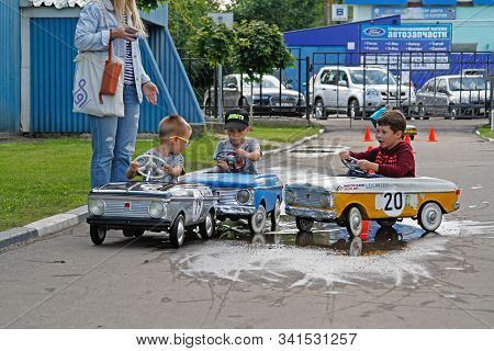 Pushkino, Moscow Region, Russia - July 13, 2019: Children Driving Soviet Pedal Cars 