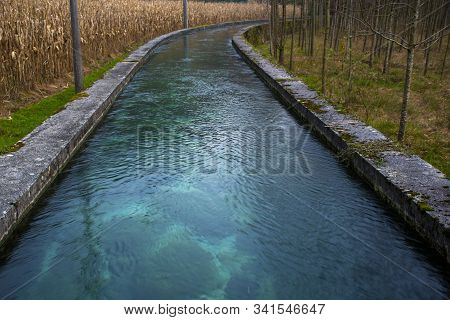 Water Channel Photographed On A Beautiful November Day Walking Through The Paths Above Arsiero, In T
