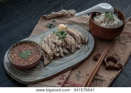 Asian Food Style Marinated Steamed Chicken (betong Chickken) With Rice And Sauce On Ceramic Plate. O
