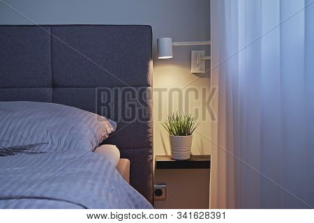 View Of Modern Minimal Style Bedroom With Beige Bedclothes And Light Wall, Copy Space