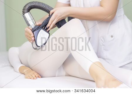 Lpg Girl Body Massage In Spa. The Girl Is Given A Hardware Massage, She Is Wearing A Special Jumpsui