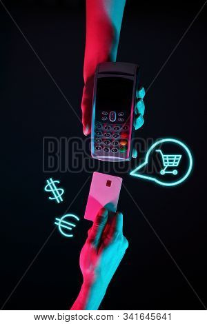 Concept Of Online Or Wireless Payments. Hands With Pinpad And Credit Card With Payment Icons. Modern