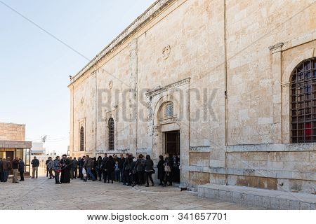 Jerusalem, Israel, December 28, 2018 : Believers Leave St. Nicholas Church After Mourning Ceremony I
