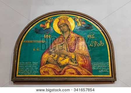 Jerusalem, Israel, December 28, 2018 : Icon Of The Mother Of God Of A Nursing Baby Hanging On The Wa