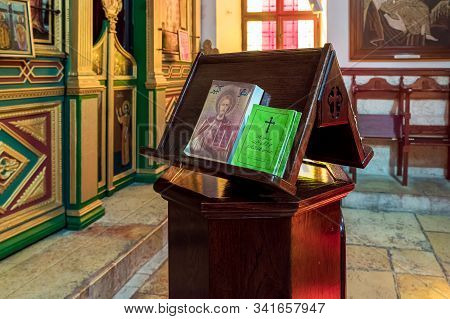 Jerusalem, Israel, December 28, 2018 : Holy Book Stand For Prayer In The St. Nicholas Church In Bay 