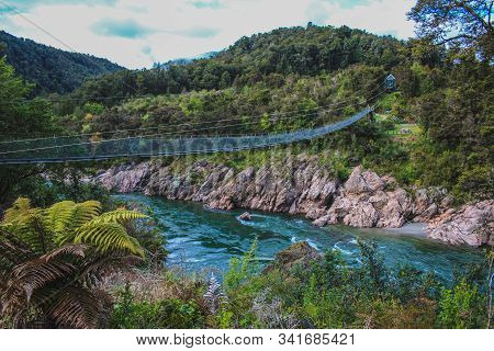 Swingbridge At Buller Gorge Above Buller River, South Island, New Zealand