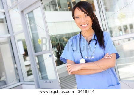 Pretty Asian Nurse At Hospital