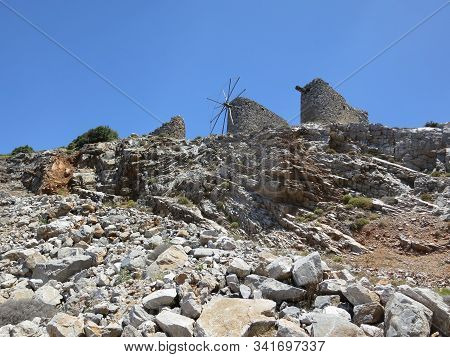 Vintage Beautiful  Windmills On Stone Rocky Mountain