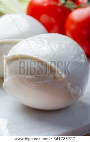 Balls Of Buffalo Mozzarella, Soft Italian Scheese Made From The Milk Of Italian Mediterranean Buffal