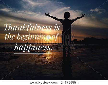 Inspirational Motivational Quote - Thankfulness Is The Beginning Of Happiness. With Blurry Backgroun