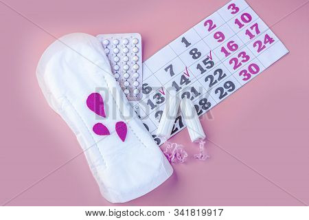 Protective Menstrual Pads, Cotton Tampons, Contraceptive Pills  And Calendar Of Menstruation Period 