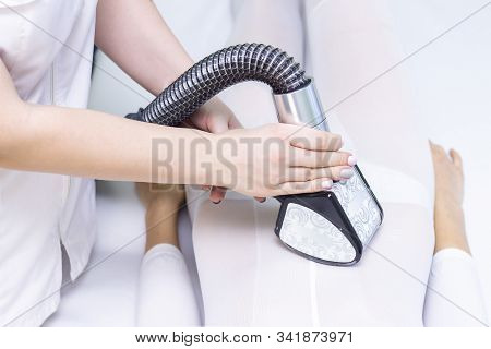 Lpg Girl Body Massage In Spa. The Girl Is Given A Hardware Massage, She Is Wearing A Special Jumpsui
