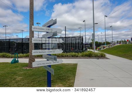 Orlando,fl/usa-11/16/19:  A Post With Signs And Distance To The United States Tennis Association Ust